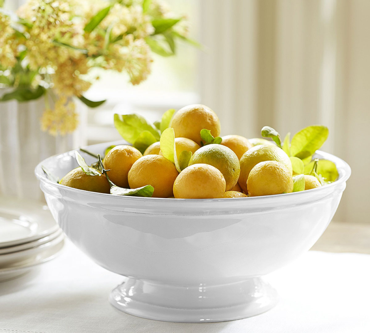Lemons in large white bowl