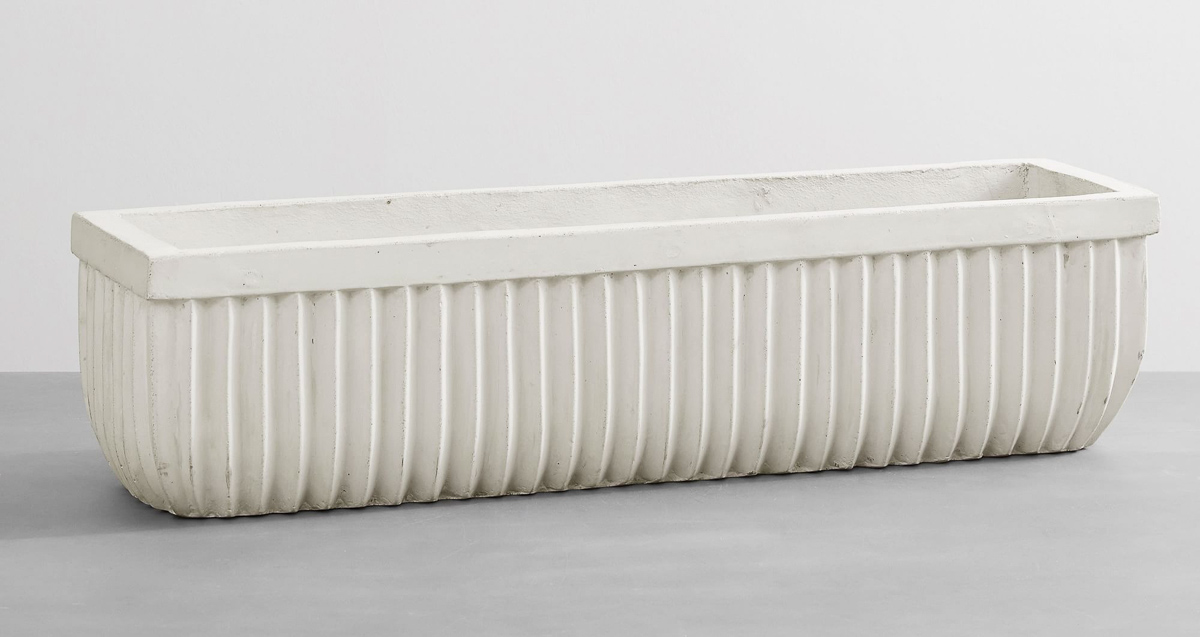White concrete trough that could be used as a centerpiece
