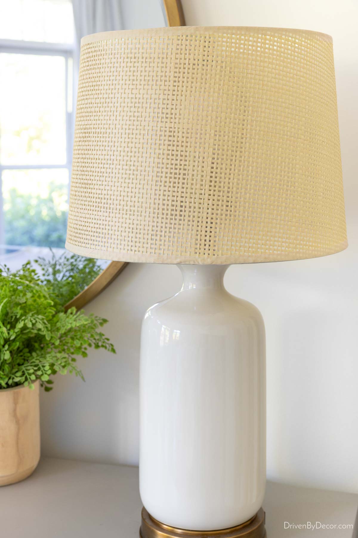 Affordable woven lamp shade on white lamp base