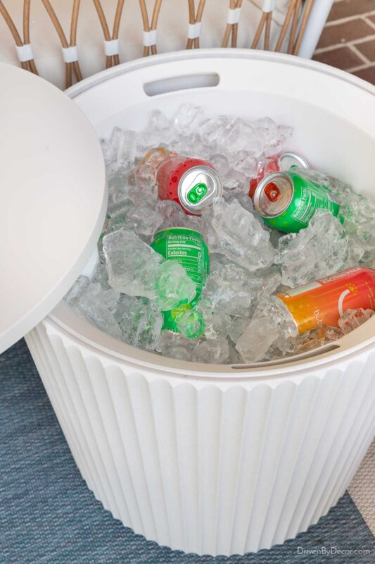 Side table with cooler inside filled with ice and drinks