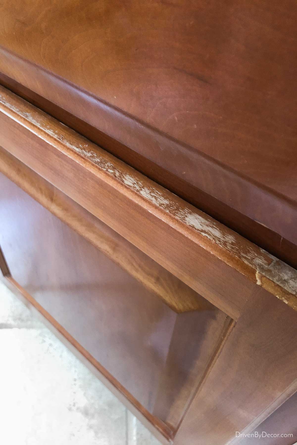 Worn door on bathroom cabinet