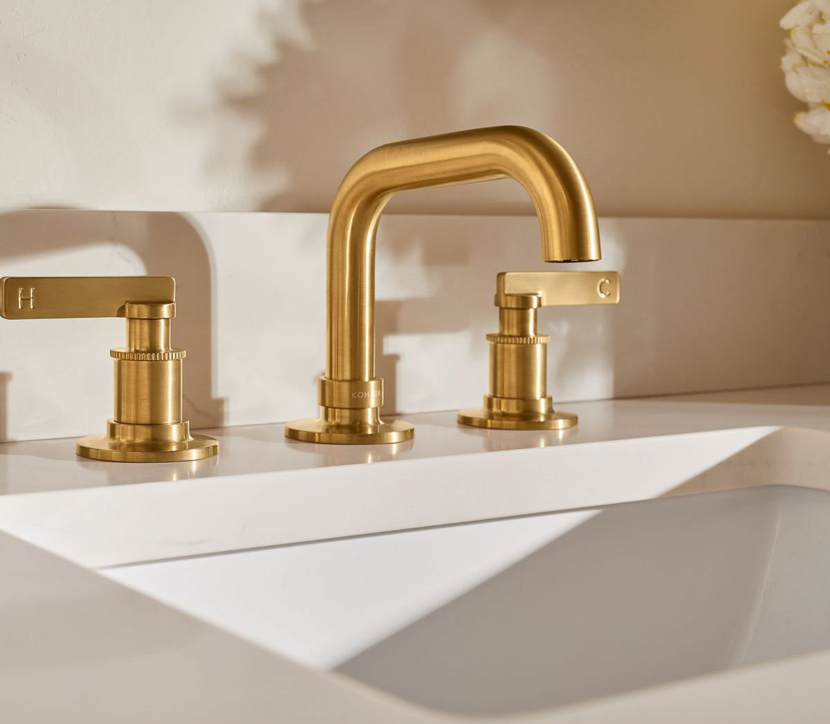 Kohler Studio McGee bathroom faucet in vibrant brushed gold