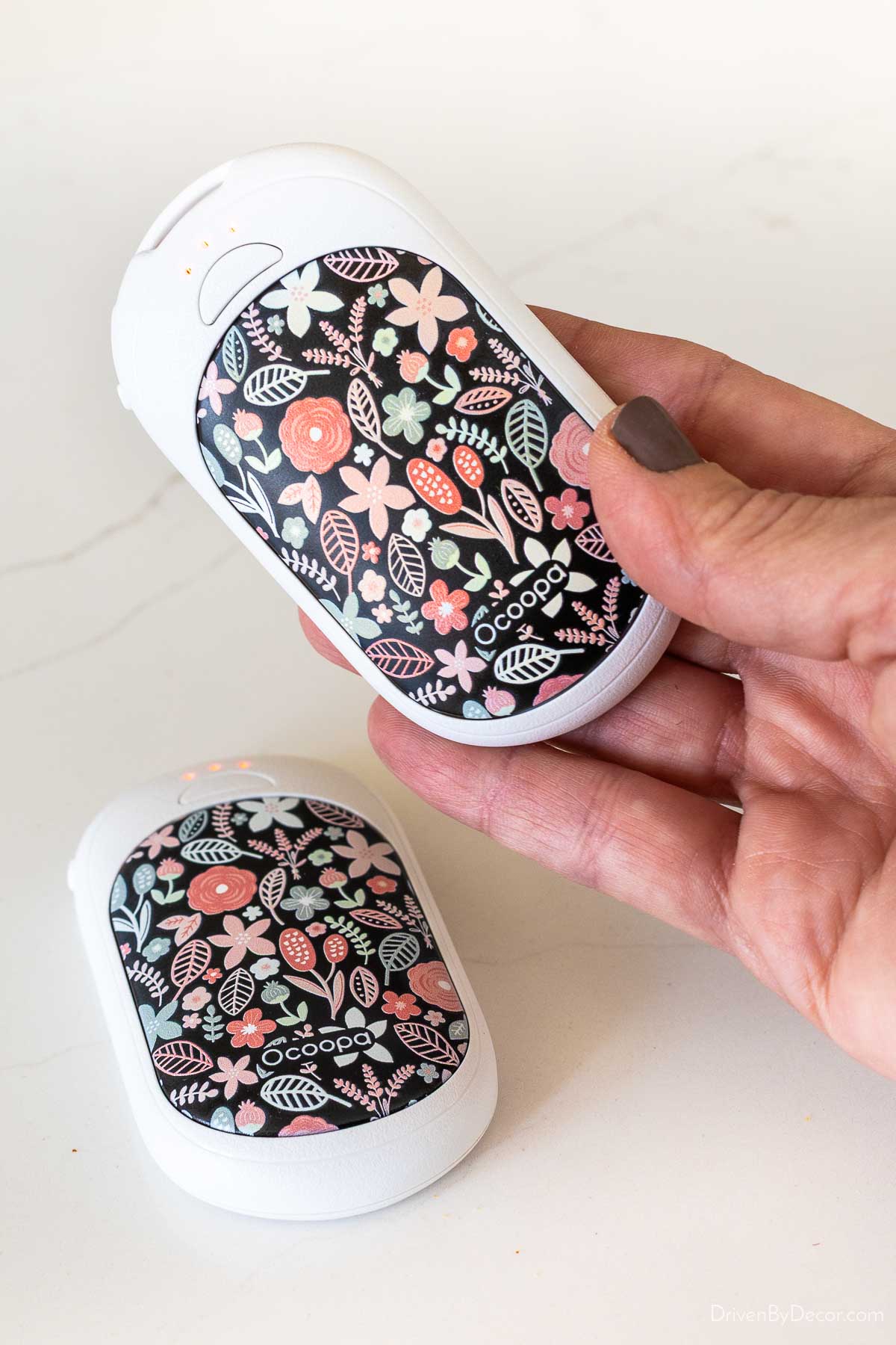 Pair of rechargeable hand warmers in floral pattern