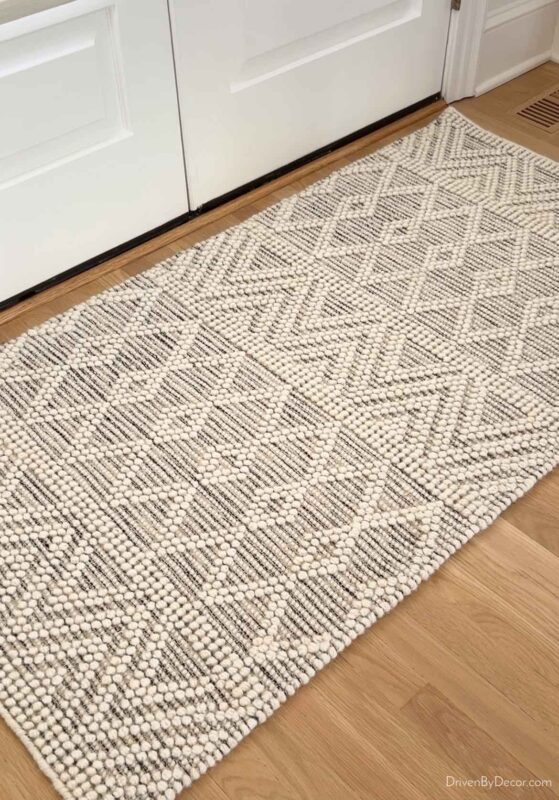 Textured neutral rug in entryway