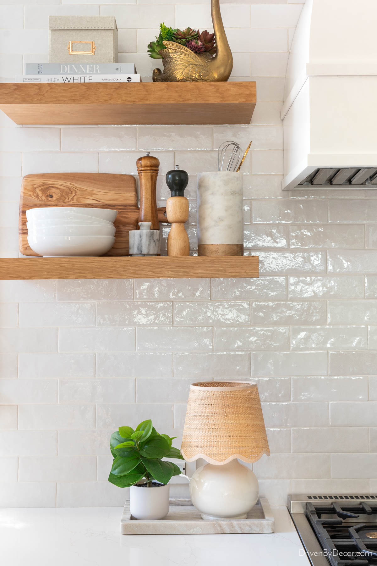 Mini lamp next to range in kitchen
