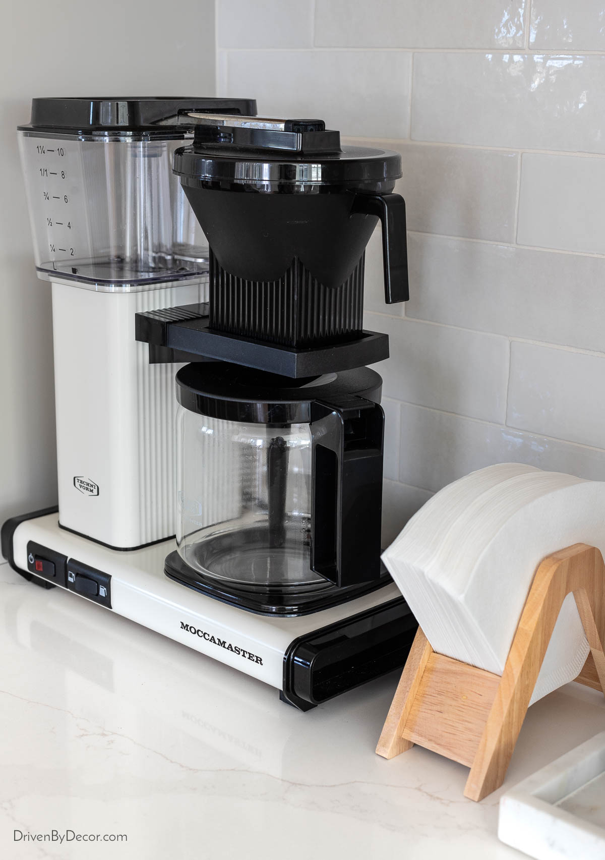 Coffee maker with filters in holder on our coffee bar