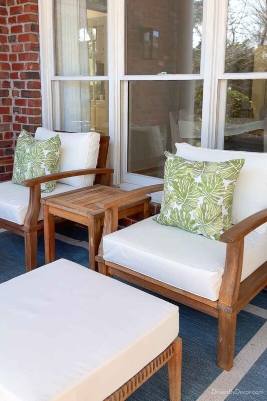 Outdoor teak lounge chair set of two chairs and a side table