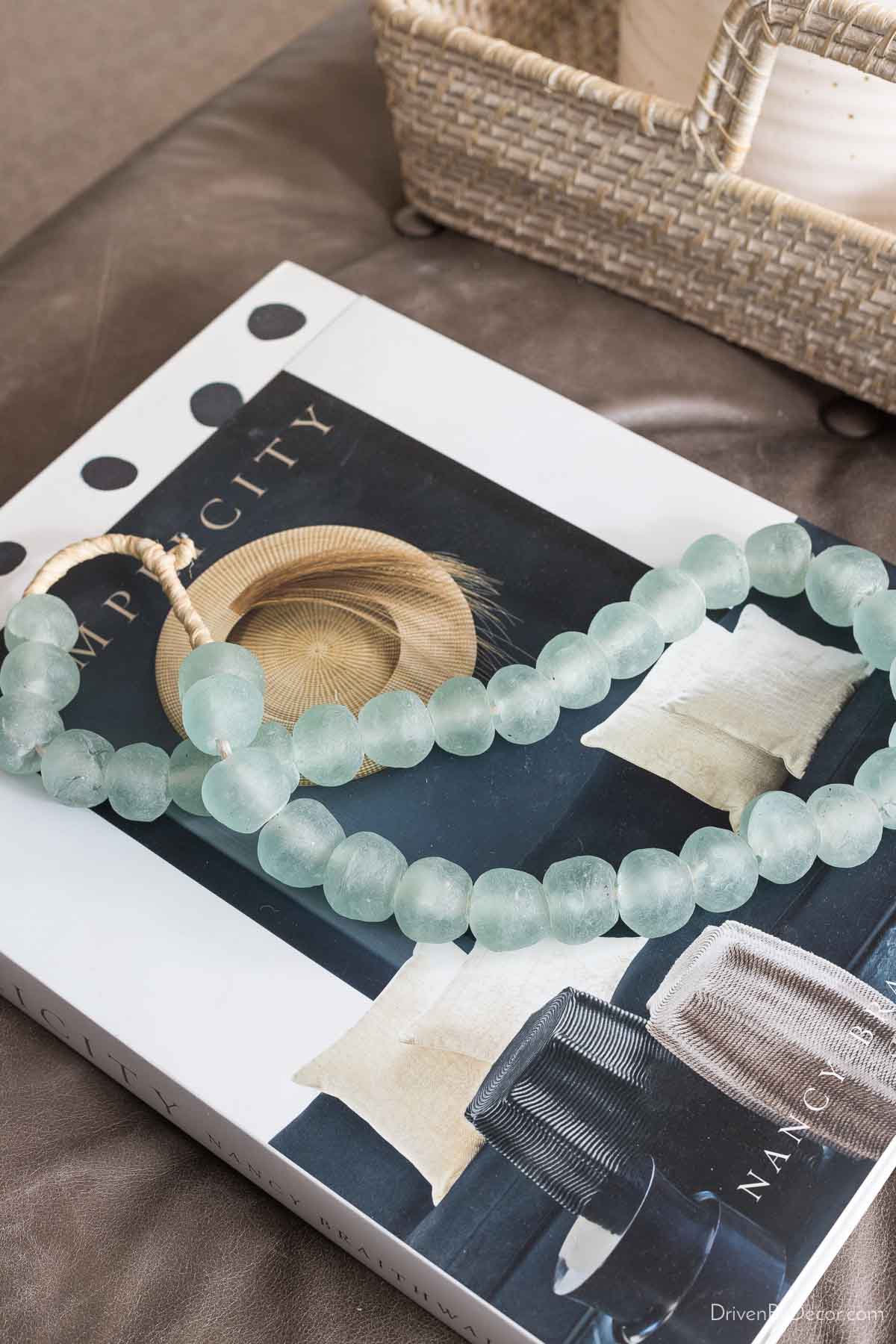 Glass beads on coffee table book