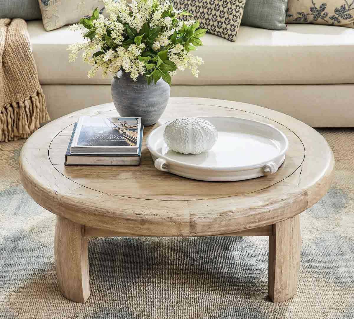 Faux greenery on a round coffee table