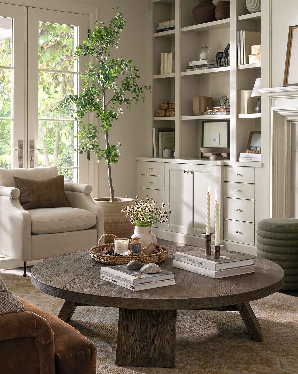 Round coffee table with styled decor