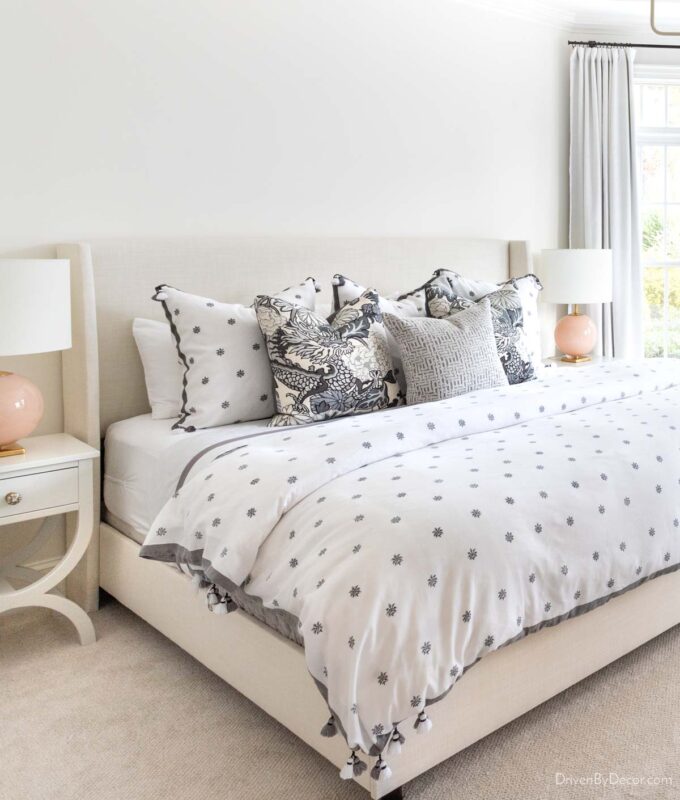 Upholstered bed in cream fabric