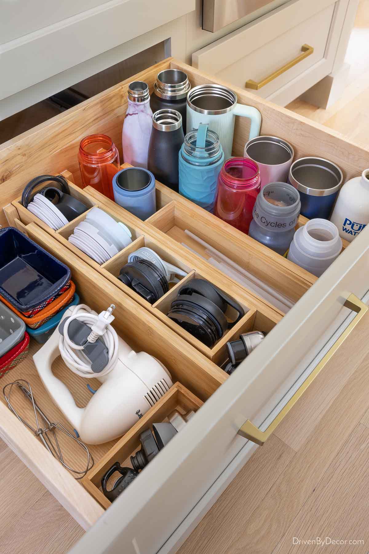 Kitchen drawer with organized water bottles