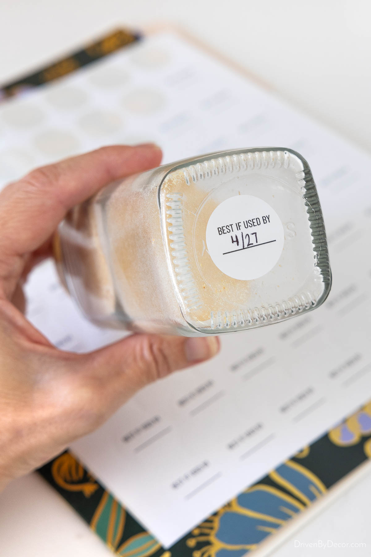 Labels on bottom of spice jars with expiration dates