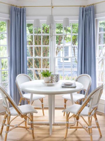 How to hang curtains in a bay window