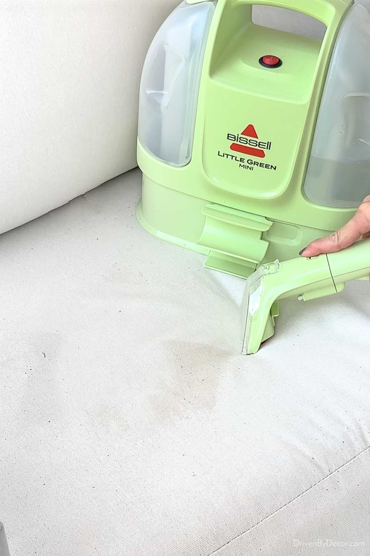 Cleaning dirty outdoor cushions with Bissell Little Green Mini cleaner