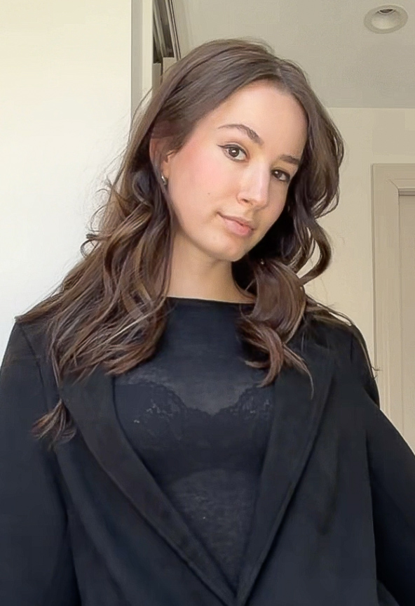 Young woman with long hair and bouncy curls