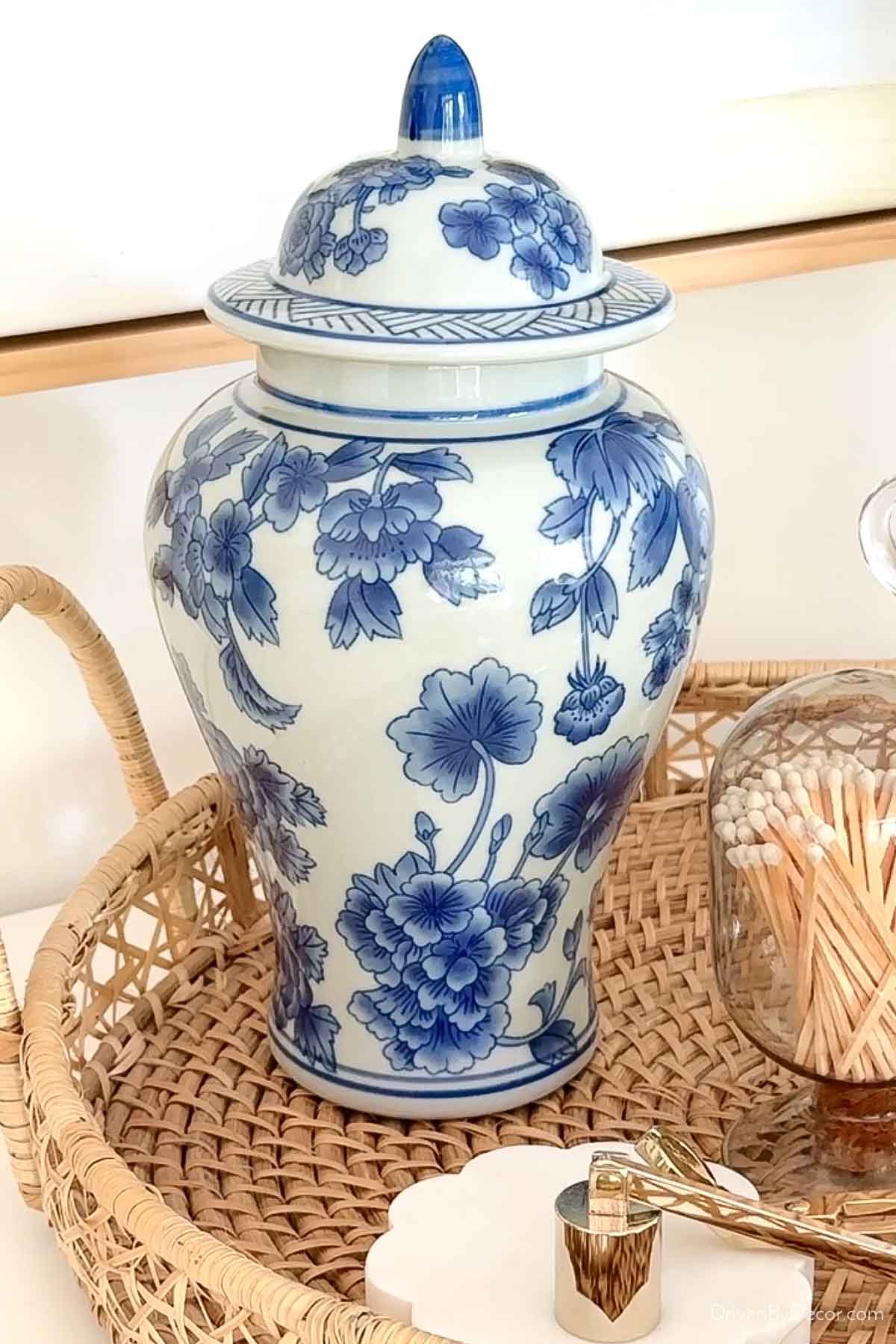 Petite blue and white jinger jar in round woven tray