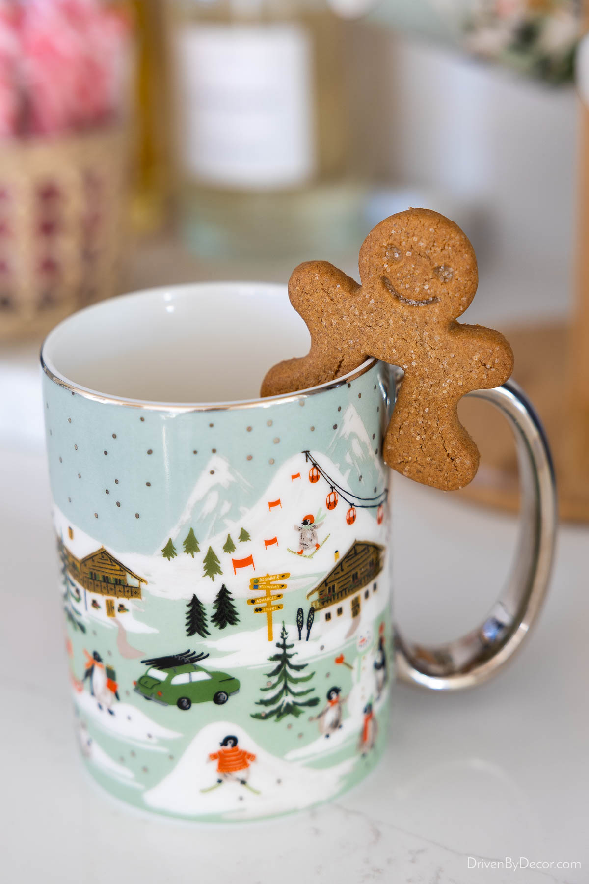 Gingerbread mug hangers on edge of coffee mug