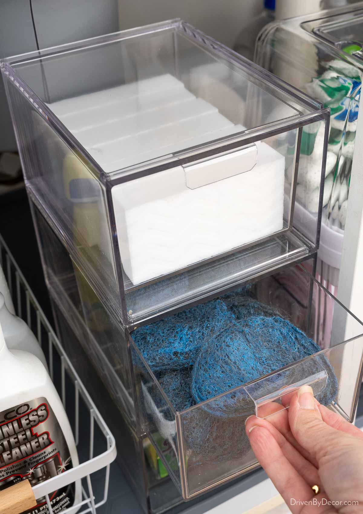 Stackable acrylic drawers with drawer open to soap pads