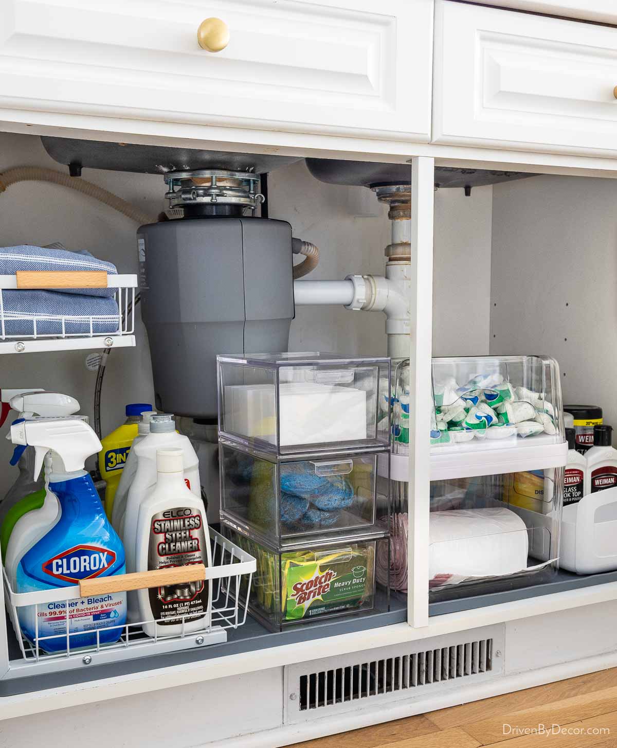 Organized cabinets under kitchen sink