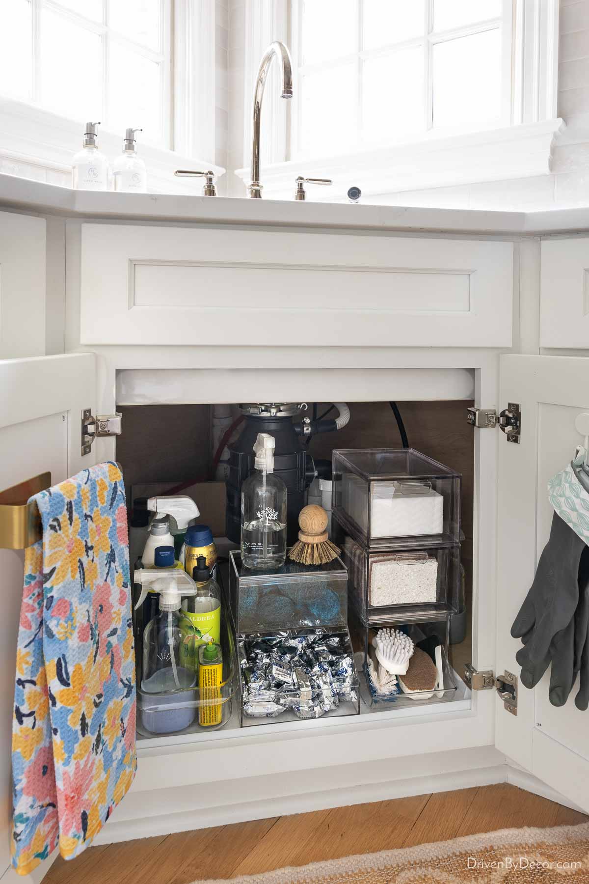 Organized space under corner kitchen sink