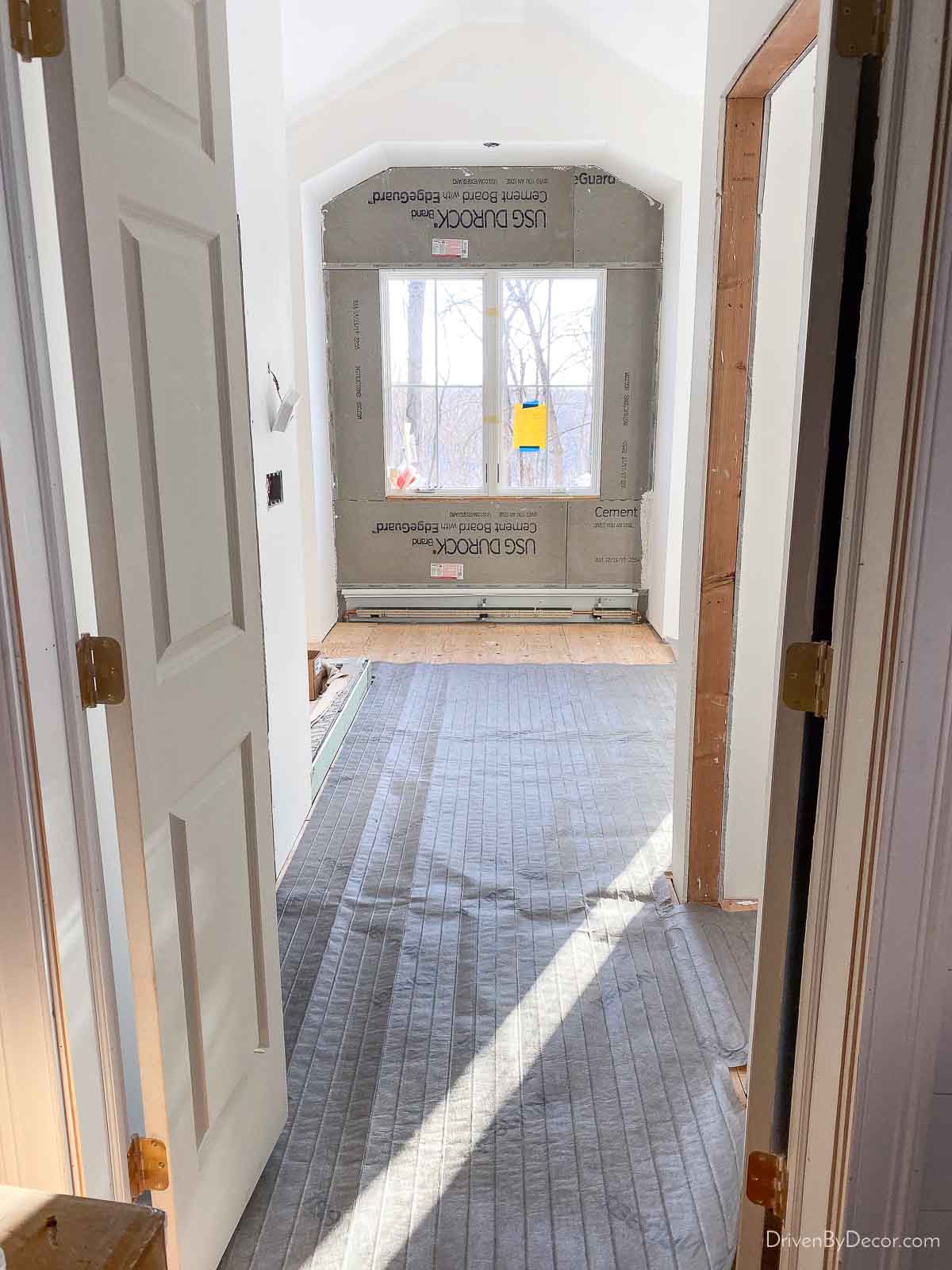 Nuheat custom heated floor mat laid out in bathroom