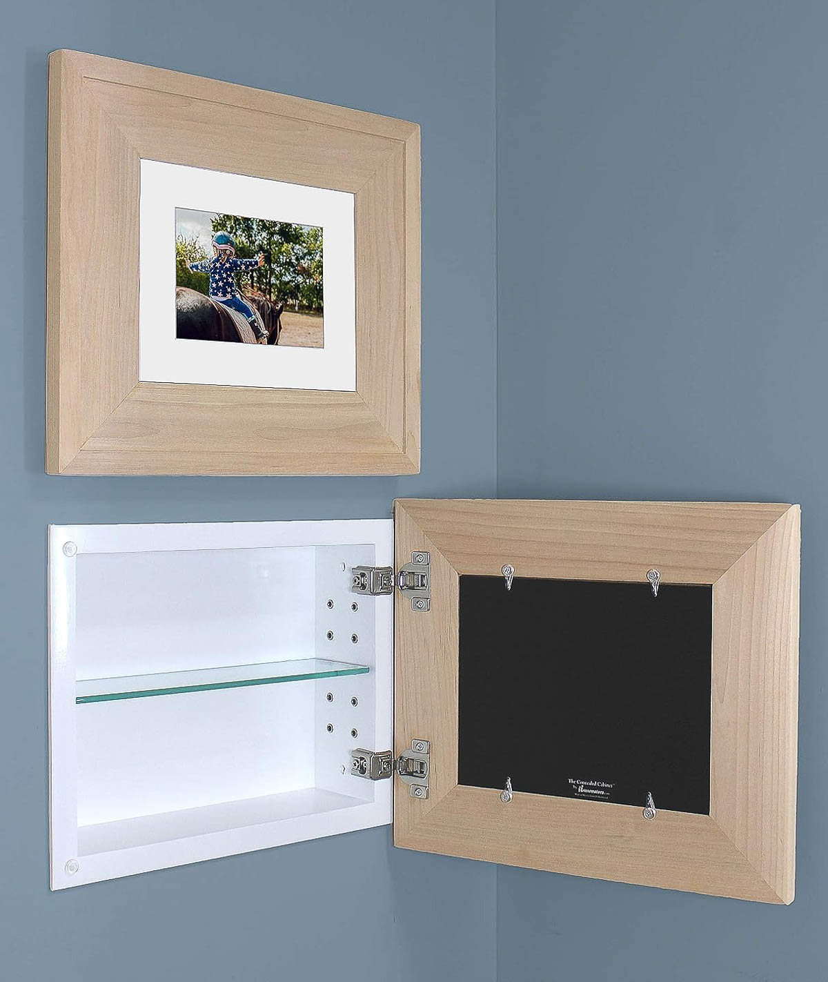 Recessed medicine cabinet with framed art