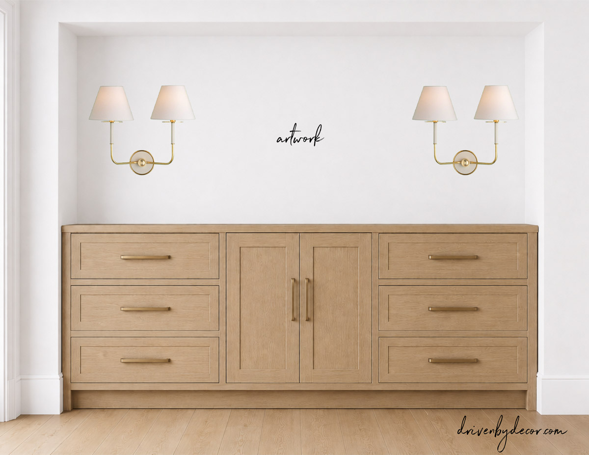 Two sets of double sconces above dining room sideboard