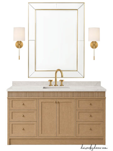 White oak bathroom vanity with large mirror flanked by sconces