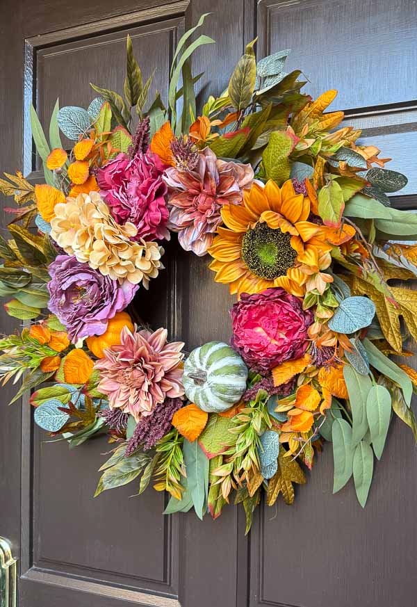 Vibrant fall wreath on front door