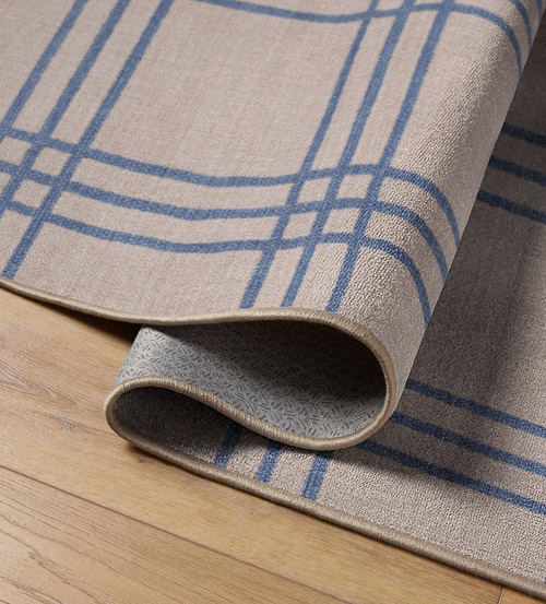 Blue plaid rug folded over