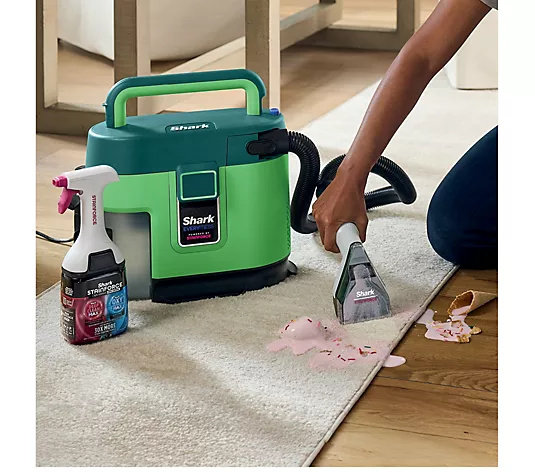 Using Everymess portable vacuum to clean up a mess on carpet