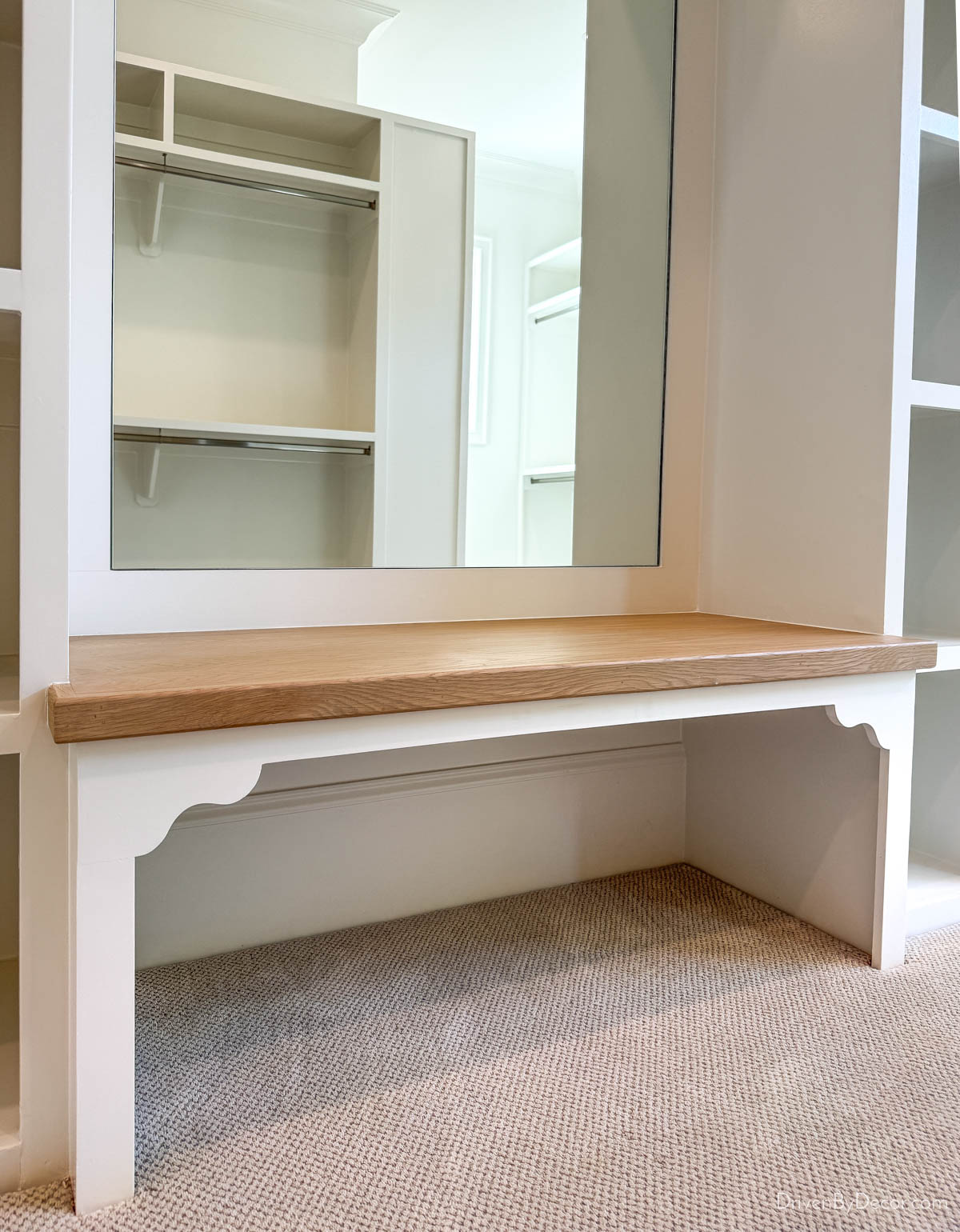 Bench with curved detailing built into closet